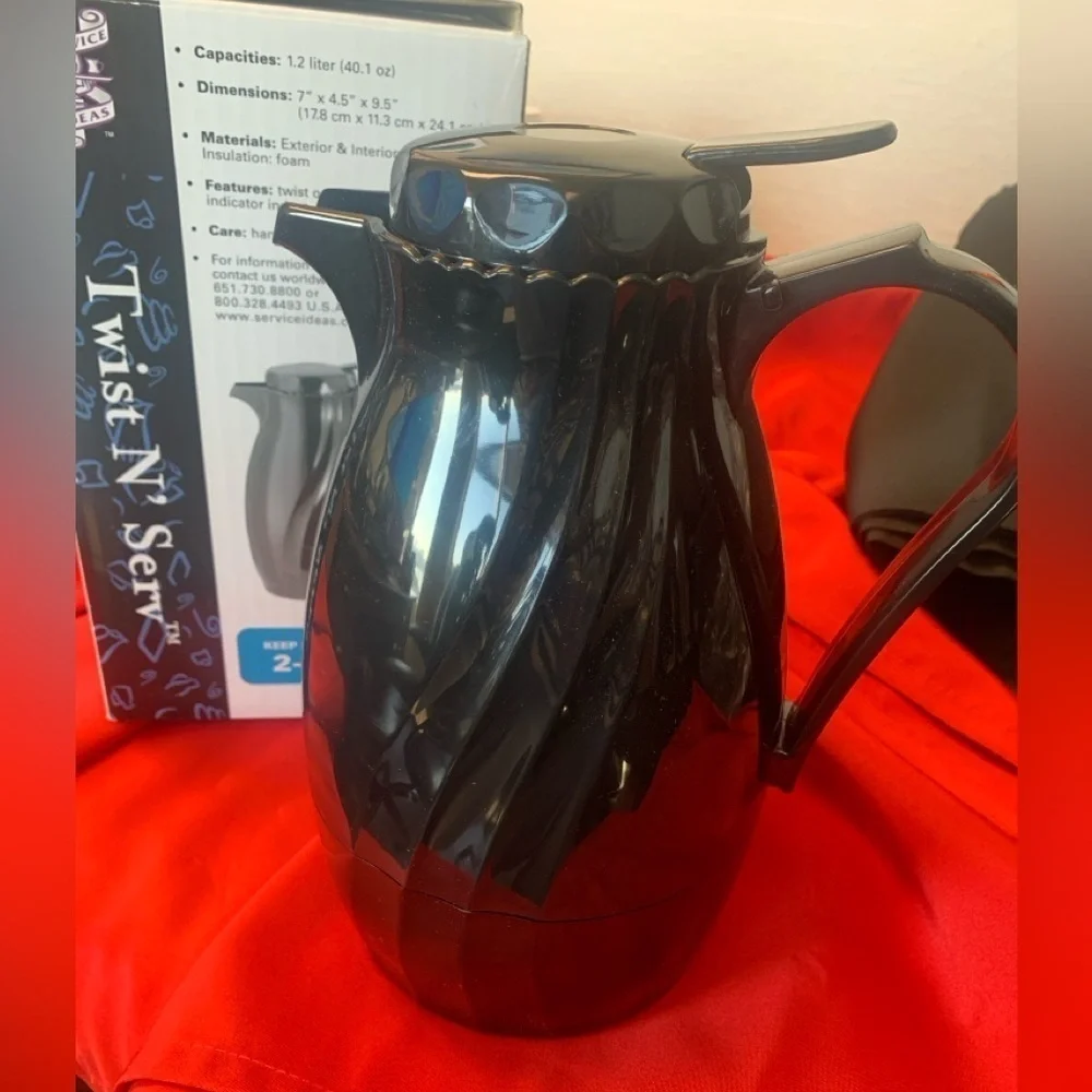 NIB 40oz Plastic Carafe keeps liquids hot or cold 2-3 hours. Black swirl color.